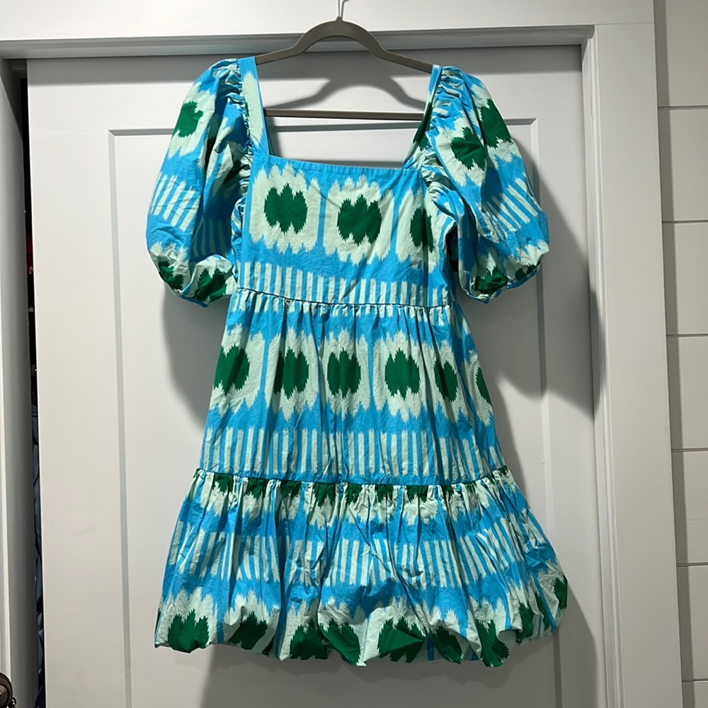Oliphant medium dress with puff sleeves, smocking on the back.